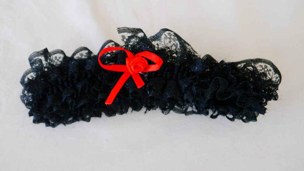 black garterwith red rose & bow