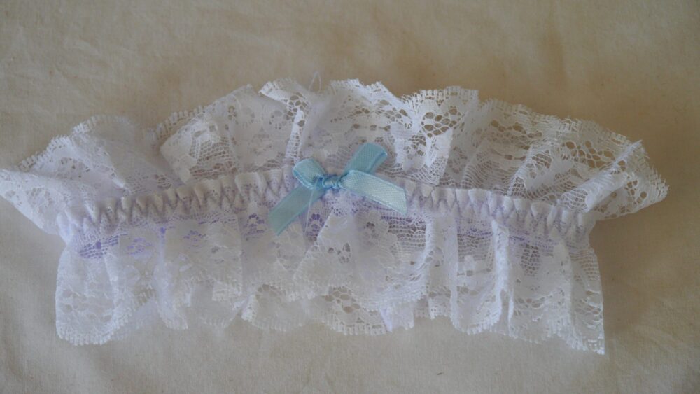 white lace garter with blue bow