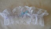 white lace garter with blue bow